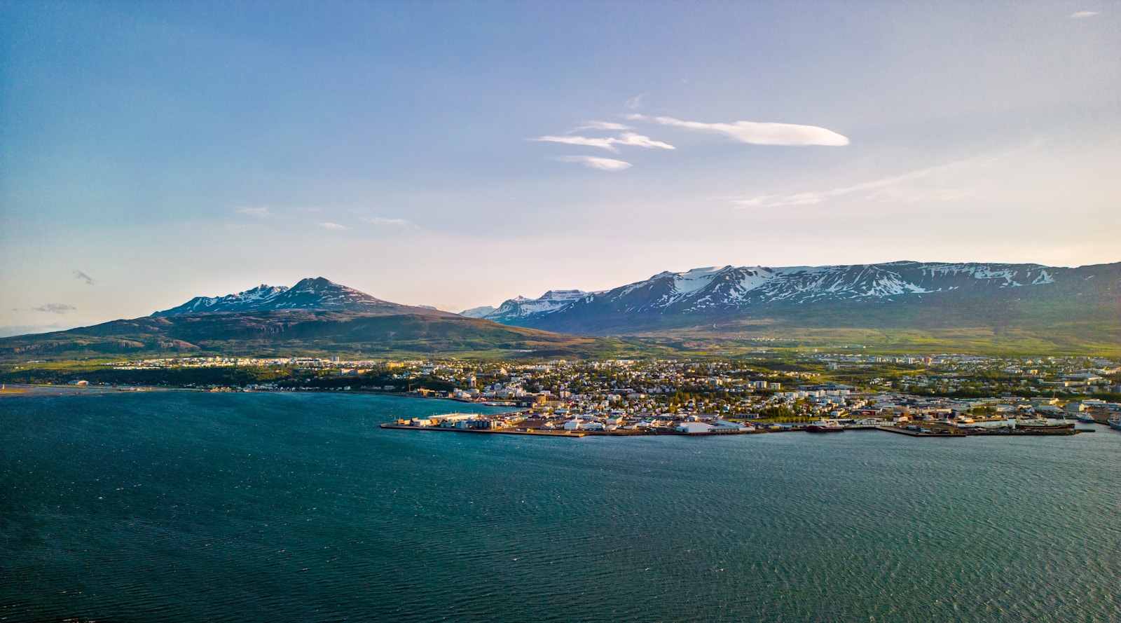 An aerial view of a city and a body of water